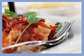 pasta with garnish and silverware