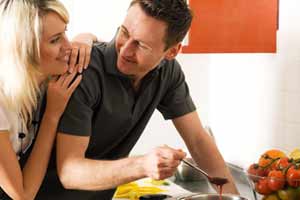 couple cooking dinner