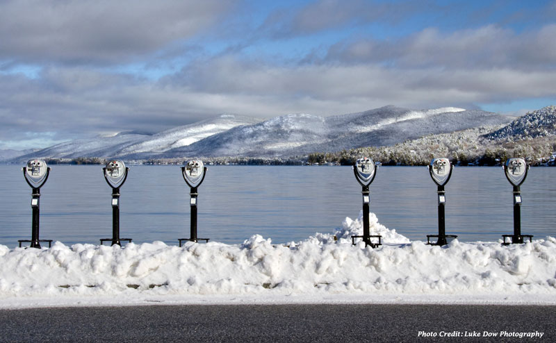 viewing devices on the shore of lake george in the snow