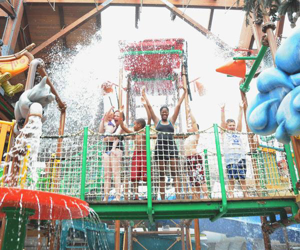 kids playing in indoor water park