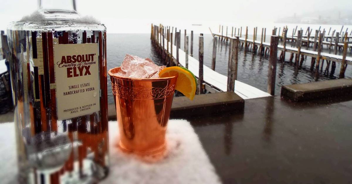 cocktail outdoors by lake in winter