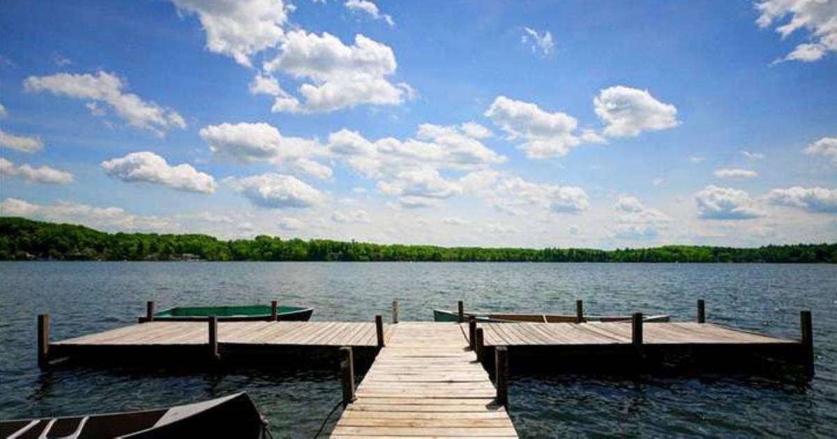 canoes by a wooden dock