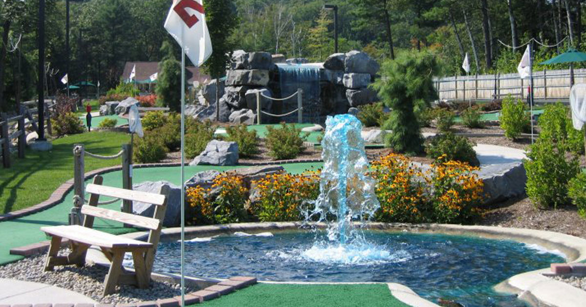 mini golf course with fountain