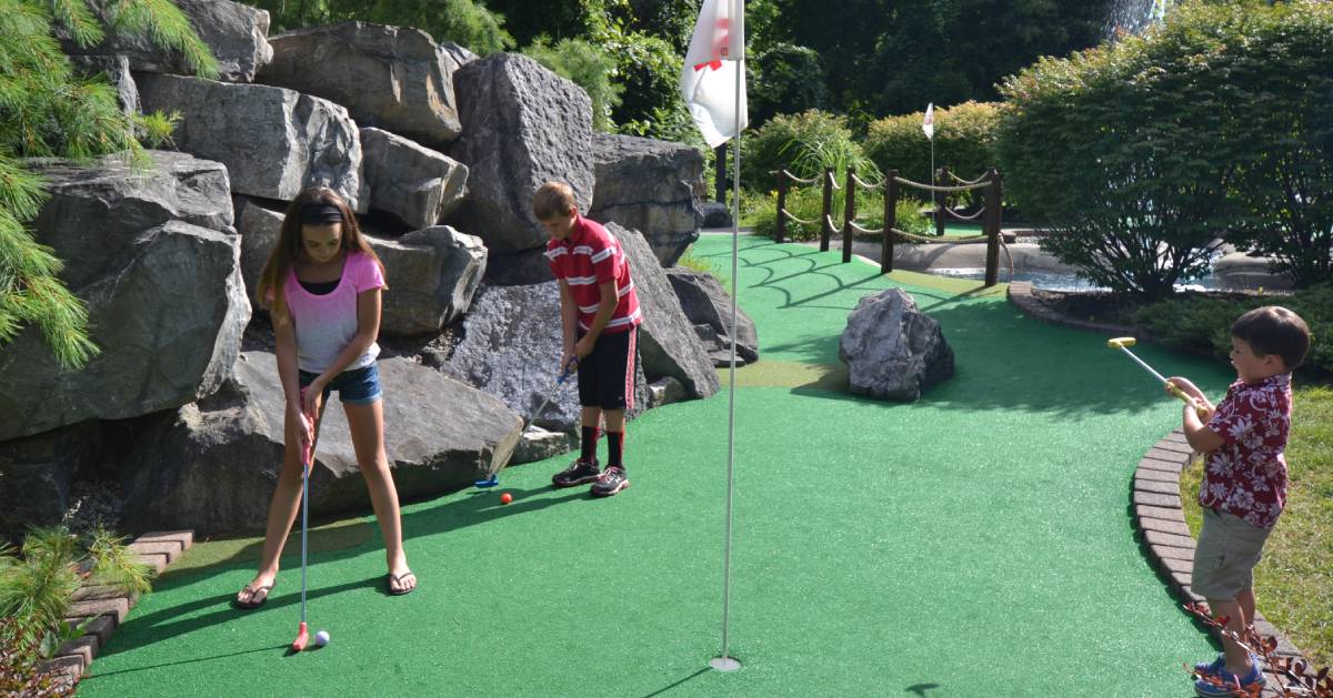 kids playing mini-golf