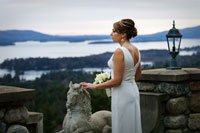 bride overlooking lake george at highlands castle