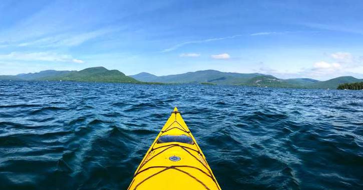 a yellow kayak on the lake