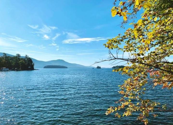 Fall leaves with background lake and mountains