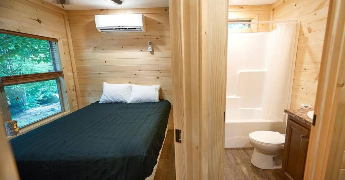 bedroom and bathroom in a cabin