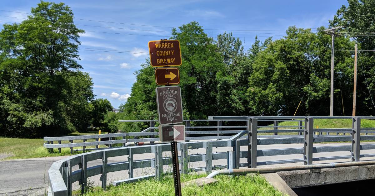 sign in the road for Warren County Bikeway