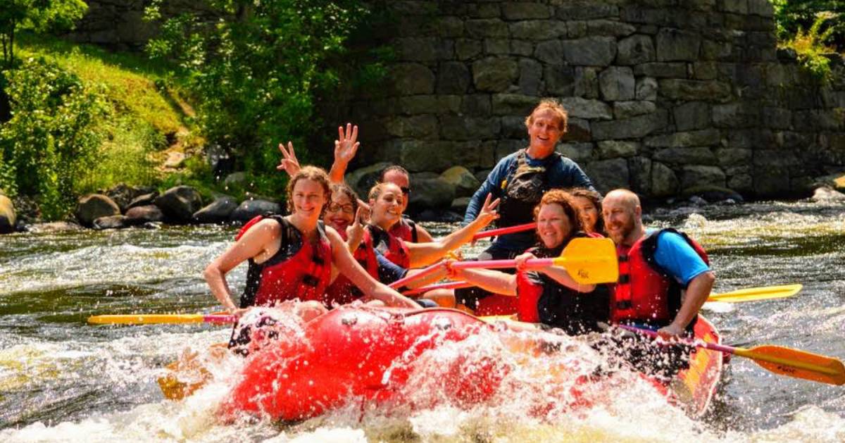 a group whitewater rafting