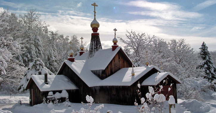 a monastery building covered in snow