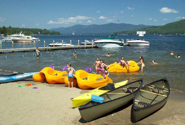 kids playing on paddleboats in lake george