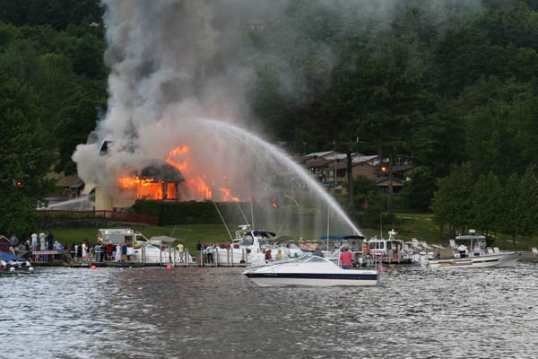 crew putting out fire from the lake