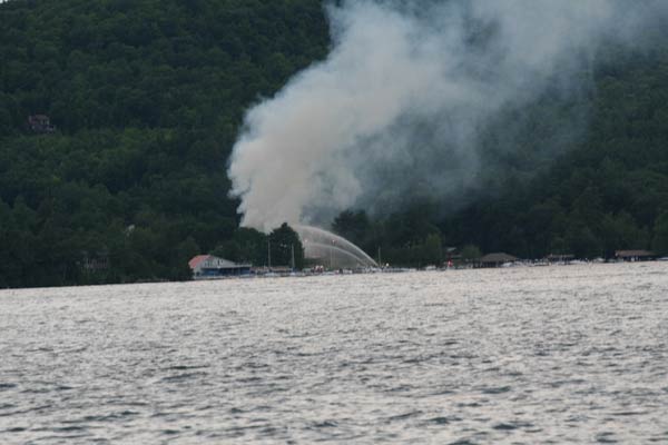 crew putting out fire from the lake