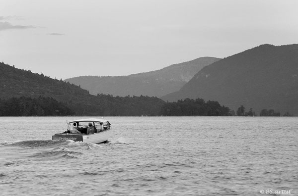 boat heading into the narrows lake george